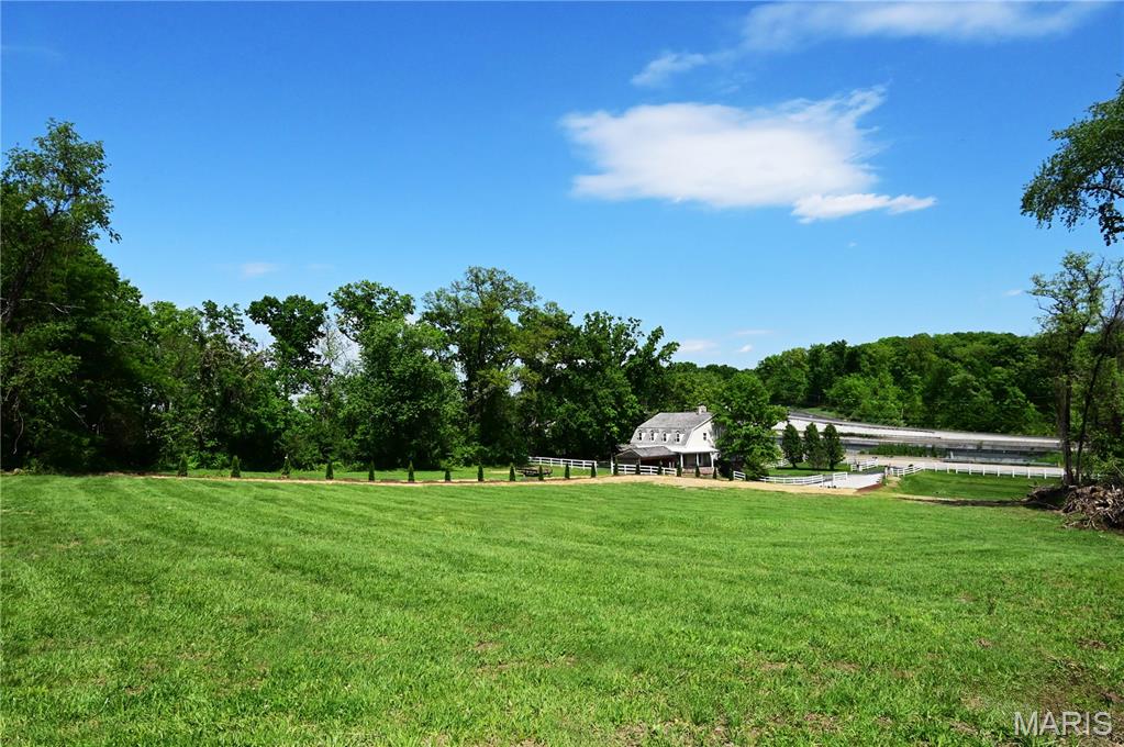 63 S Woods Mill Road — photo 1